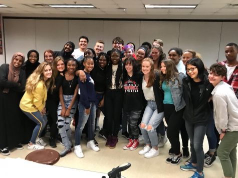 The ISJ class poses with activist Aalayah Eastmond.